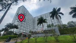 a tall building with a red target in front of it at Saigon Getaway Apartment Thu Duc in Ho Chi Minh City