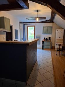 a kitchen with a counter top in a room at le sans soucis in Bellevaux