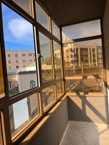 a view from an office window of a building at Apartment sunah in Nador