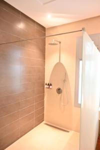 a shower with a glass door in a bathroom at BBr in Jacqueville +41 photos