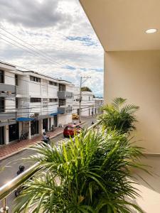 a view of a city street from a building at Fuscaldo Hotel in Valledupar