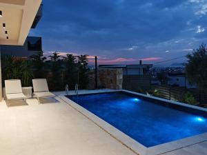 a swimming pool on the roof of a house at Villa Bartula in Bar +20 photos