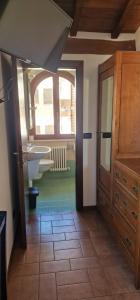 a bathroom with a sink and a mirror at Albergo Ristorante Terme in Acquasanta Terme