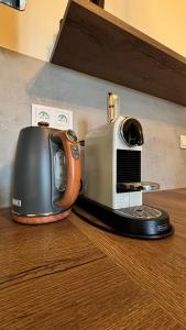 a toaster sitting on top of a counter at Riverside Vrchlabí in Vrchlabí
