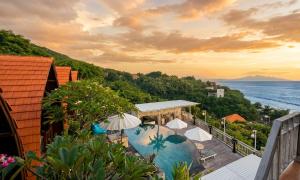 a view of a resort with a swimming pool at Permata Hill Nusa Penida in Nusa Penida
