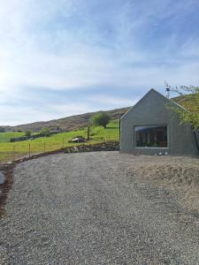 a smallolithicolithicolithicolithicolithicolithicolithicolithicolithicolithicolithicolithicolithic house at Sunny Hills Cottage in Cornamona