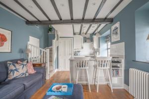a living room with a couch and a table at The King's Arms in Hawkshead