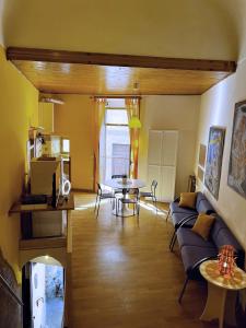 a living room with a couch and a table at Nel Cuore di Lanciano - WeclHome in Lanciano
