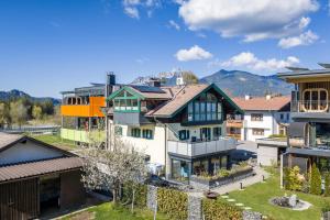 an aerial view of a group of houses at Alpenapart Singer - contactless check-in in Reutte