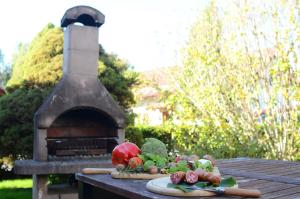 a bunch of vegetables are sitting on a table at Blockhaus Rosa Reischl in Neubeuern
