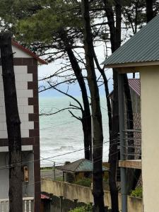 a view of the ocean from a house at Grigoleti Royal in Grigoleti