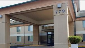 a building with the number on the front at White Pine Lodge in Salamanca