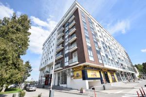 a large building on a city street at Apartman Valentina Aqua Park in Jagodina