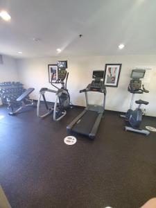 a gym with several exercise bikes in a room at White Pine Lodge in Salamanca +1 photo