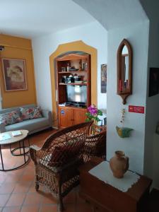 a living room with a couch and a table at Casa Algiana - Private Pool in Loulé