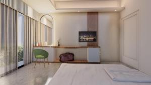a bedroom with a bed and a desk and a chair at Hotel Adi International in Rājshāhi +8 photos