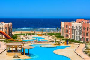 a view of a resort with a water park at شاليه in Marsa Alam