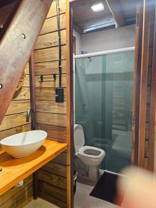a bathroom with a sink and a toilet at Cabana Redonda Beach in Icapuí