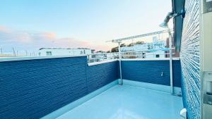 a view from the balcony of a cruise ship at Direct to every spots 4mins to station 4Lines for used Big House Family Direct Shinjuku Ikebukuro 3 Bedrooms Max for 8 people in Tokyo