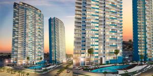 a rendering of a city with two tall buildings at Oceanica Departamento in Iquique