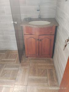 a bathroom with a sink and a shower at BRISAN descanso sol,y playa in Barra del Chuy +6 photos