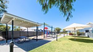 a park with a playground with a swing at Escape to 39 at Cape View in Busselton