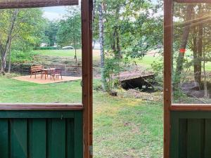 a view of a yard from a window of a house at 6 person holiday home in Ucklum-By Traum in Ucklum