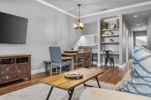 a living room with a table and a dining room at Comal Rive Pool Gruene Hall by Barclé in New Braunfels +44 photos