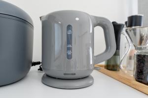 a tea kettle is sitting on a counter at Coto House Kamakura RoomB in Kamakura