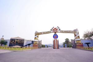 a gate at the entrance to a amusement park at HOTEL AIKAA in Hyderabad