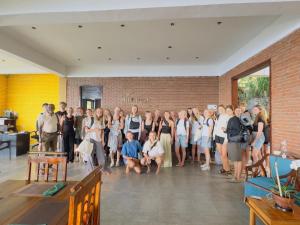 a group of people posing for a picture in a room at Hillcrest Ella in Ella