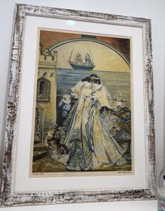 a picture of a painting of a woman with a boat at Hôtel Le Neptune en Camargue in Saintes-Maries-de-la-Mer