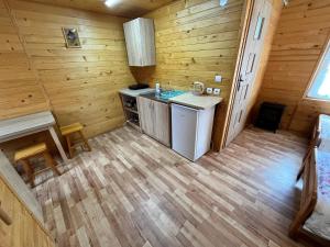 an overhead view of a kitchen in a log cabin at BiesChatki in Wetlina +59 photos