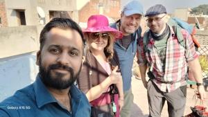 a group of people posing for a picture at Agam Homestay-Two Minutes Walk From Golden Temple in Amritsar +38 photos