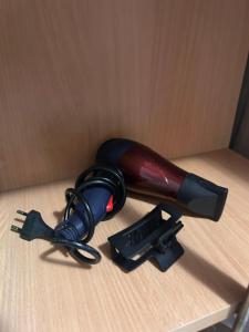 a flashlight and a gun on a table at Vikendica Aurora in Šabac