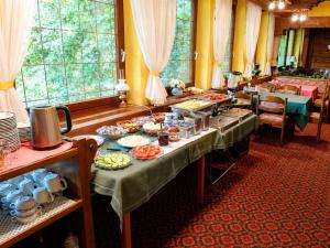 a buffet line with tables with food on them at BaB Hotels and Apartments-Zum Letzten G'Stehr in Bad Rippoldsau