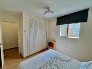a bedroom with a bed and a window at Vera Naked in Vera +6 photos