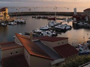 a harbor with boats docked in the water at Harbour Club in St Francis Bay