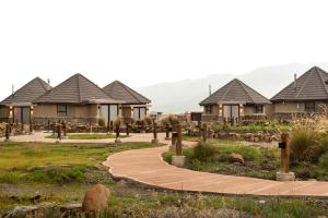 a row of houses at a resort at Sani Mountain Escape in Mokhotlong
