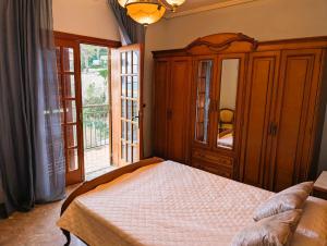 a bedroom with a bed and a large window at Urmi 8 Vista Mar in Peniscola +20 photos