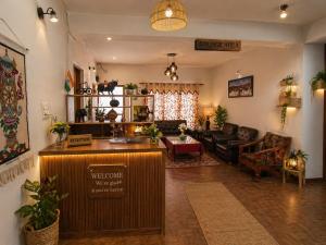 a living room with a couch and a table at Stendel Villa Fort Road, Leh in Leh