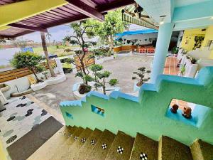 a view of a house with a model of a house at Fumigate Hotel in Hengchun South Gate