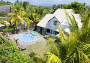 an aerial view of a house with a swimming pool at Beach Escape in Trou d'Eau Douce