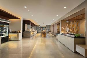 a lobby of a store with aasteryasteryasteryasteryasteryasteryasteryasteryastery at Courtyard by Marriott Bali Nusa Dua Resort in Nusa Dua