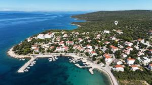 an aerial view of a small island in the water at Carpe Diem*** in Jakišnica