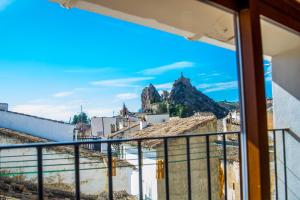 a view of the mountains from a balcony of a house at Casa Corralazos in Castril