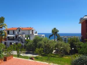 a view from the apartment building at Oasis Villa - Sea View Pool, Sanremo in Sanremo
