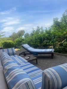 a group of couches and a hammock in a playground at La Panouse in Marseille
