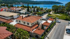an aerial view of a city with houses and a street at Taşhan Apart Otel in Didim