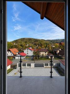 a view out of a window of a building at Willa Nowa 33 in Wisła
